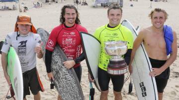 Cronulla Open Men's Champion Ben Dewhurst (yellow) holds the 110 year old Paddy McCue Cronulla Titles trophy. Picture John Veage