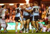 The Sharks celebrated success against the Dragons but face a tough three-week stretch. (HANDOUT/NRL PHOTOS)